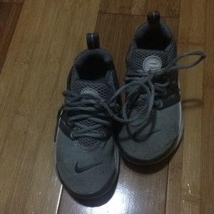 Grey Nike shoes kids
