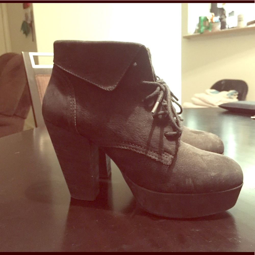 Black booties that lace up