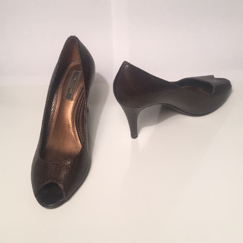 Brown leather snakeskin heels.