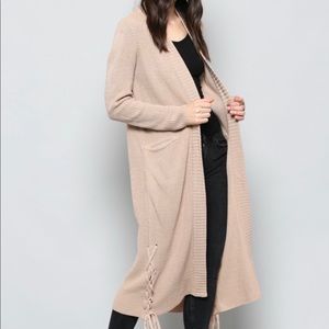 Long knit cardigan with lace up details