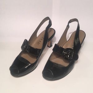 Anyi Lu black patent peep toe sling back heels.