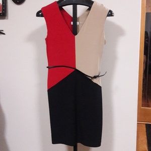 Woman dress black, red and tan