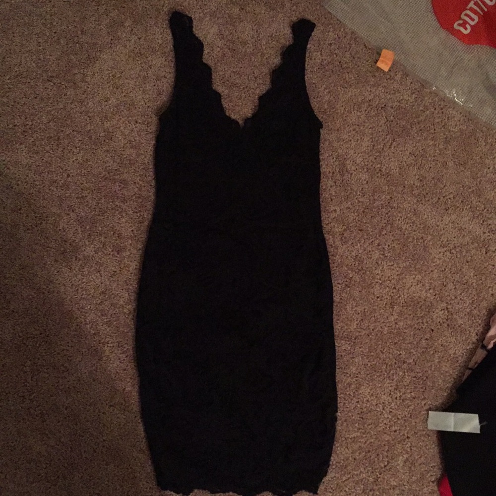 Black form fitting lace dress