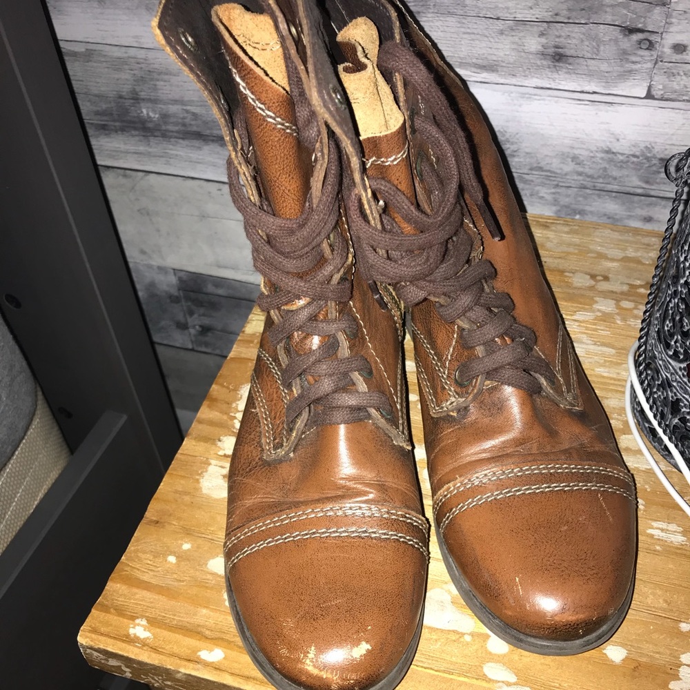 Lightly worn combat boots
