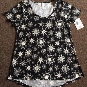 Small LuLaRoe holiday snowflake classic!