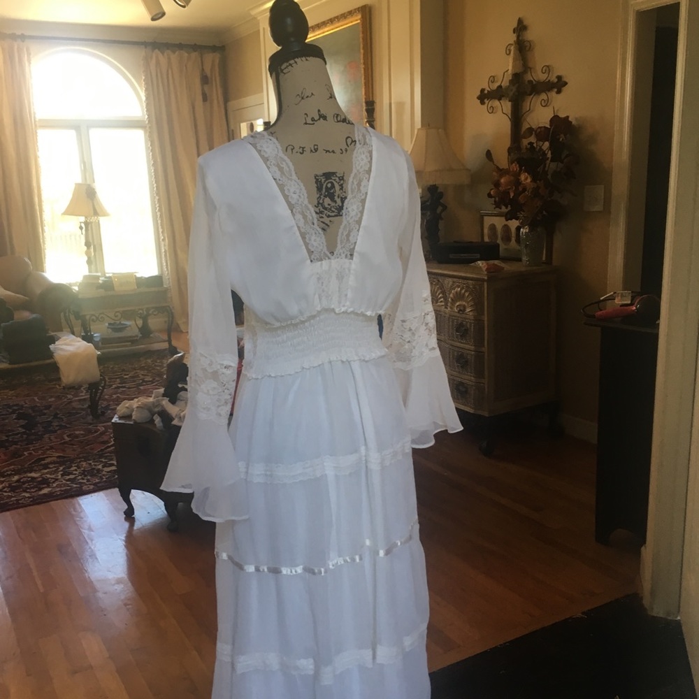 Gorgeous detailed white floor length dress