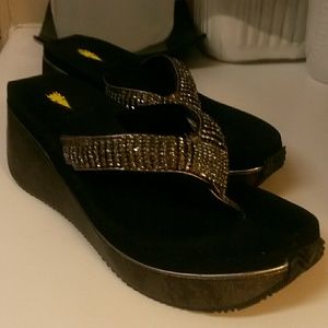 Volatile jewel encrusted sandals