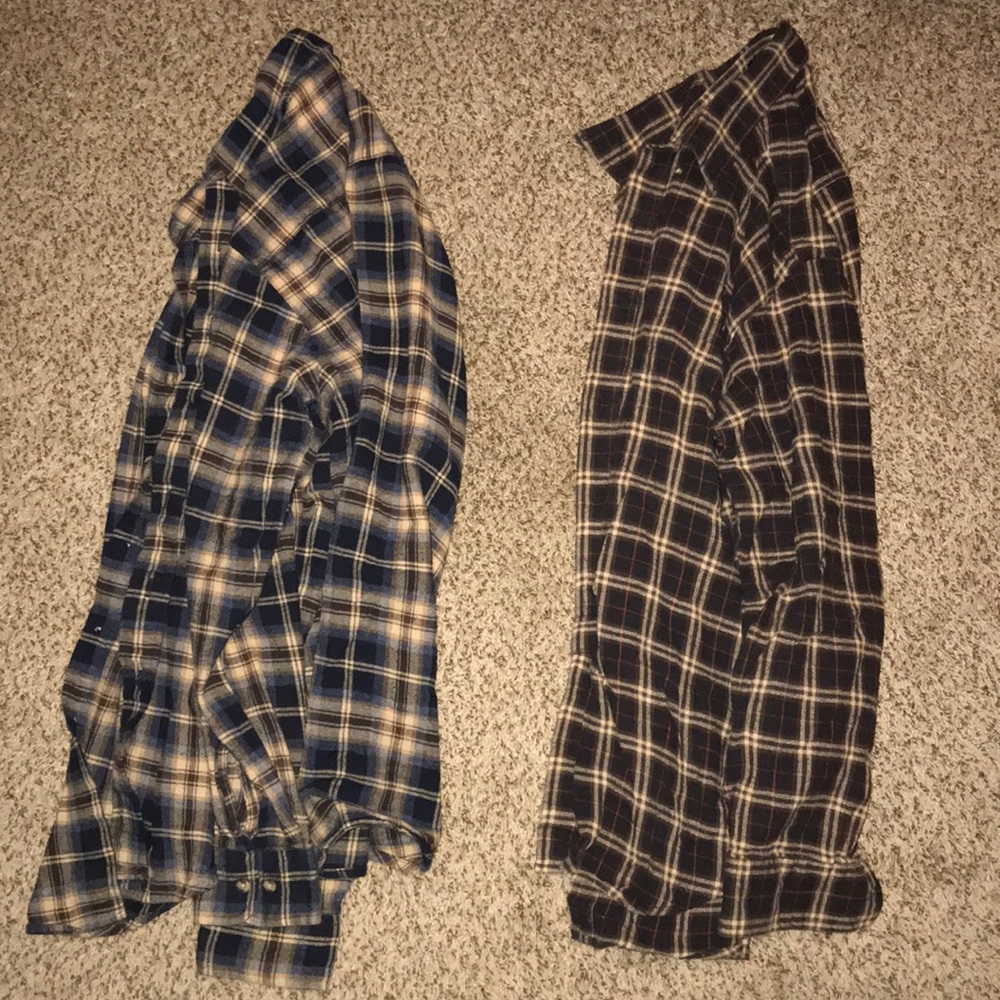 (2) long sleeved button-up flannel shirts
