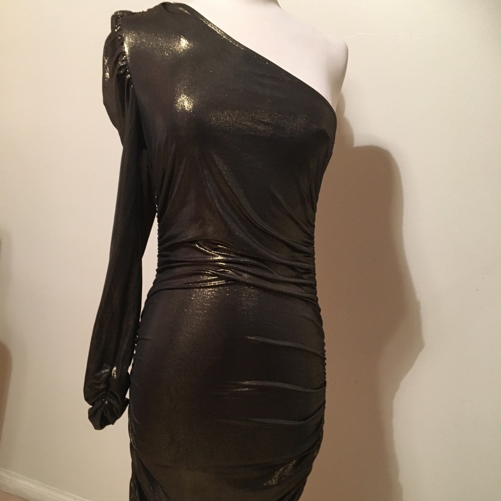 SOLD** Date night asymmetrical dress size L