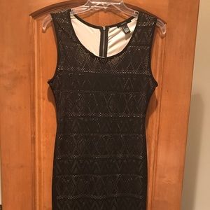 Bodycon black dress with nude details