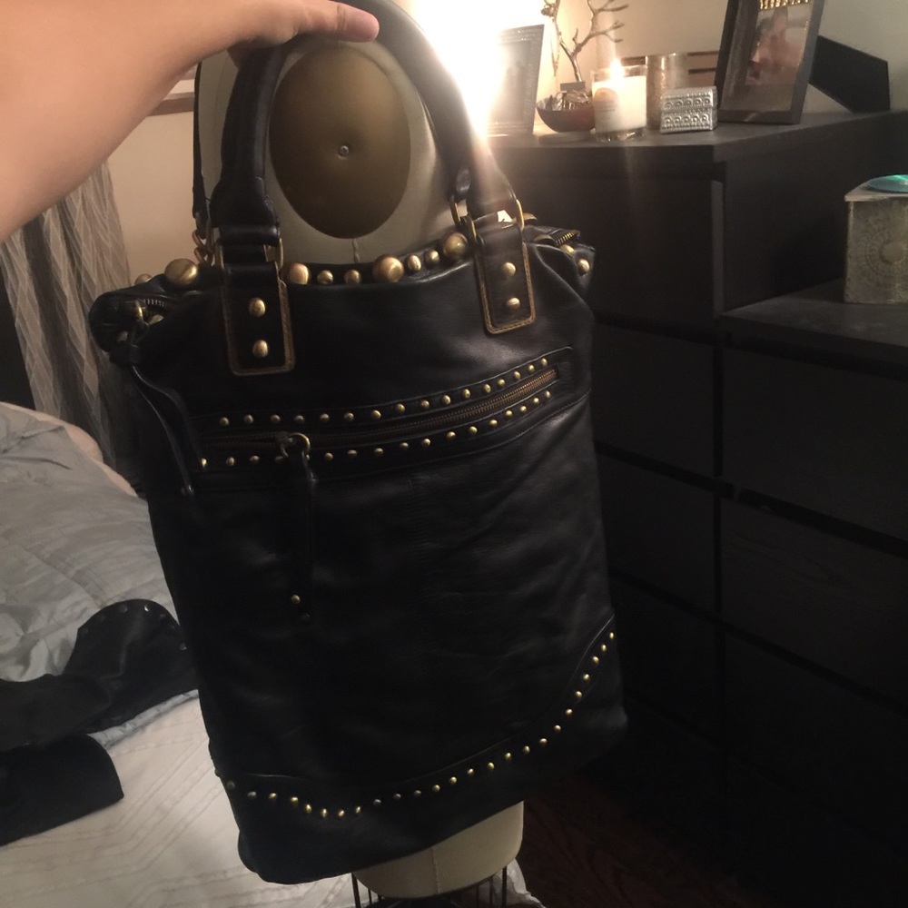 Black leather bag with gold hardware
