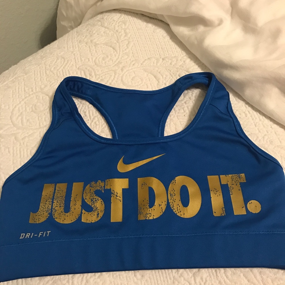 Blue and gold Nike sports bra