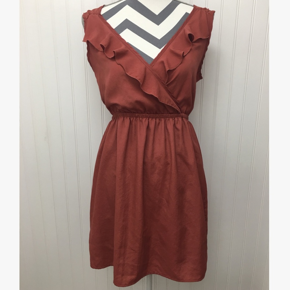 Ruffle, cross neck dress