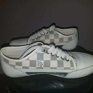 Louis Vuitton (white low tops)