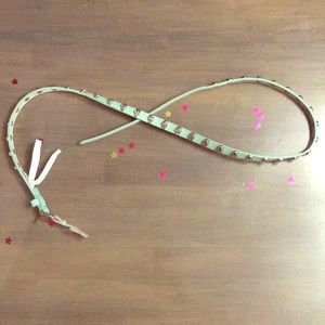 Thin blue belt with skulls