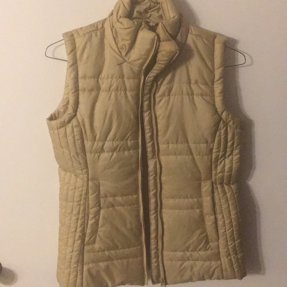 New York and company. Gold vest