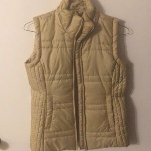 New York and company. Gold vest