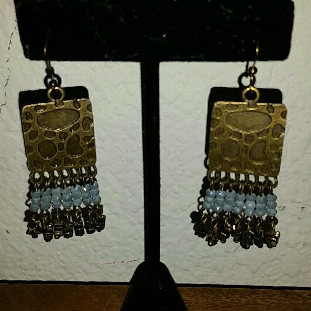 Light blue crystal bead stars dangle brass earring