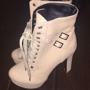 Brand New never worn high heel, laceup Booties