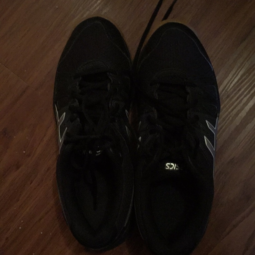 Black ASICS volleyball court shoes
