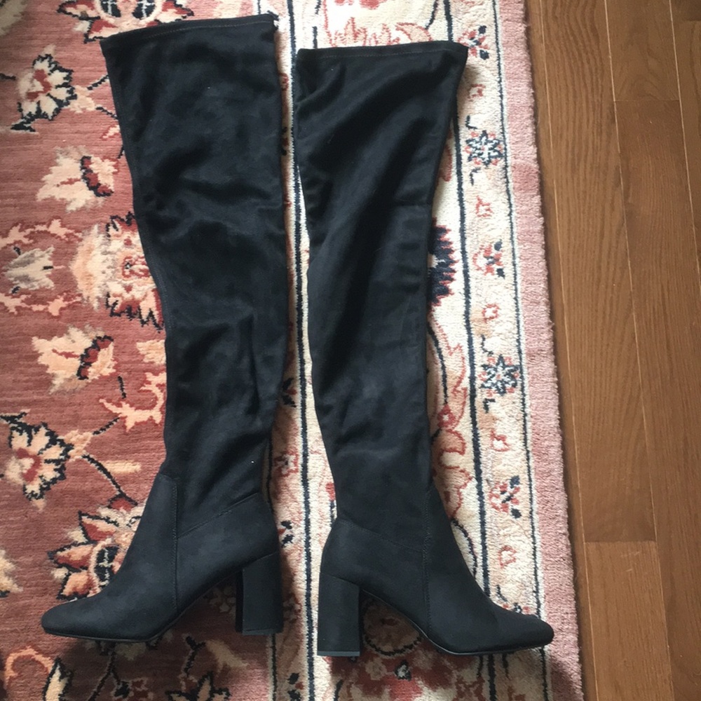 Thigh high black boots