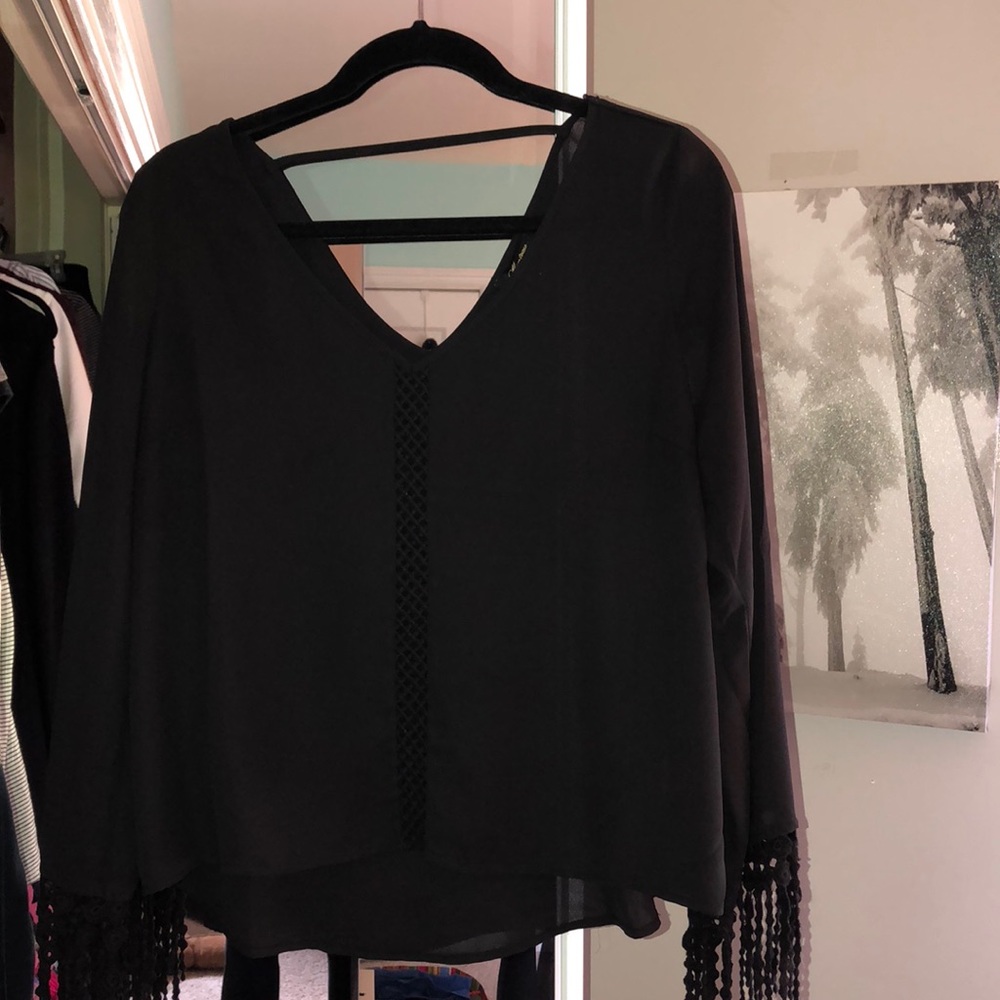 Adorable black top with cute sleeves !