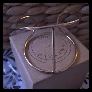 Beautiful gold bangle by Emerald +Duv