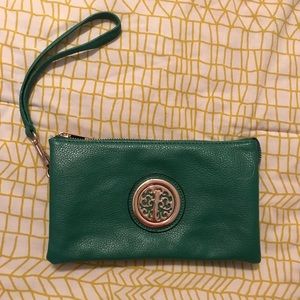 Green leather wristlet.