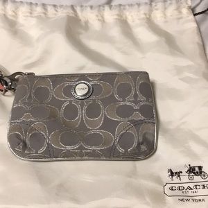 Coach grey metallic wristlet