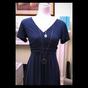 Navy V neck dress.