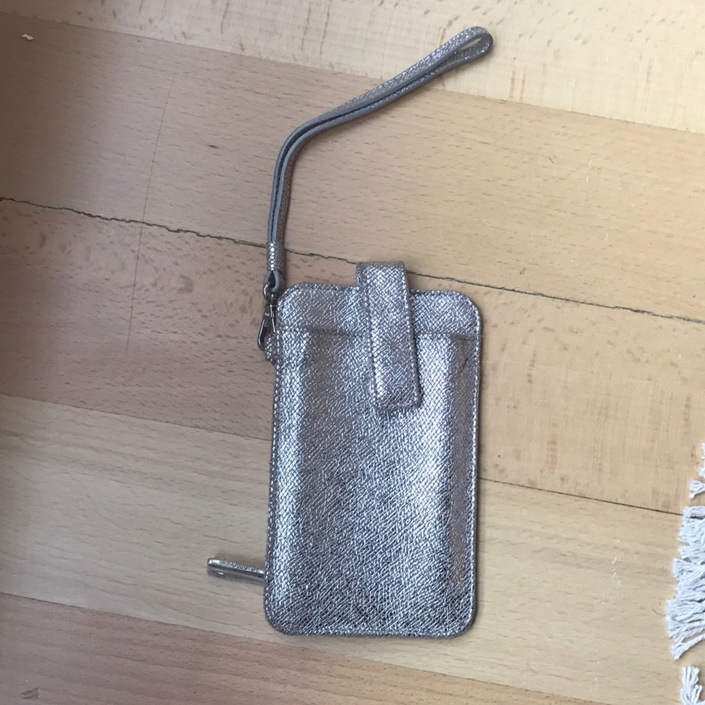 Cute metallic wristlet by Saks!