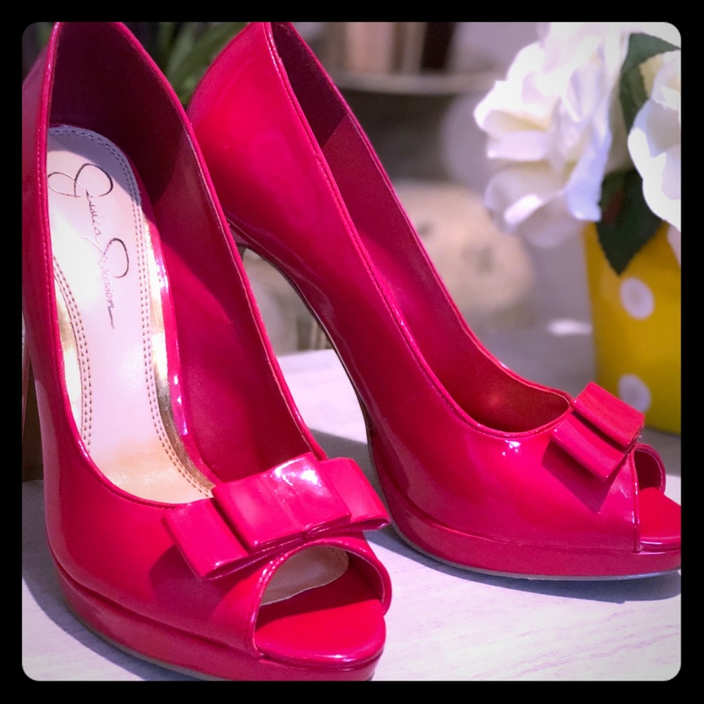 Hot pink Peep toe pumps