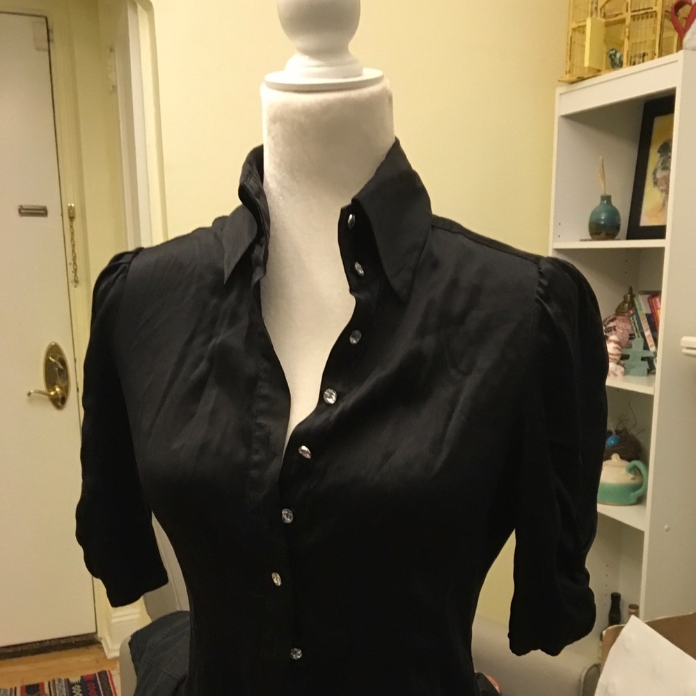 Black satiny top with feminine buttons