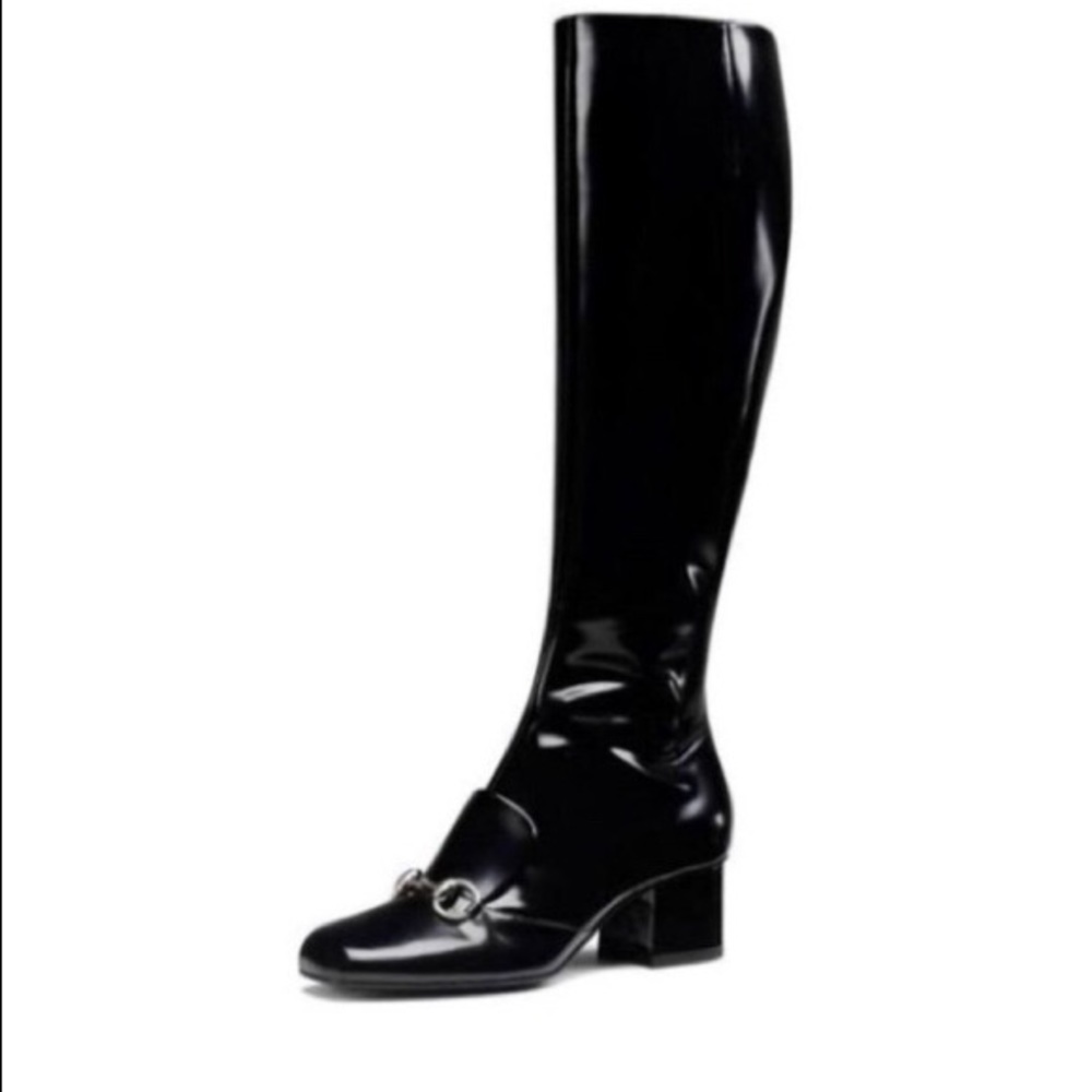 2015Gucci Lillian runway patent leather boots.