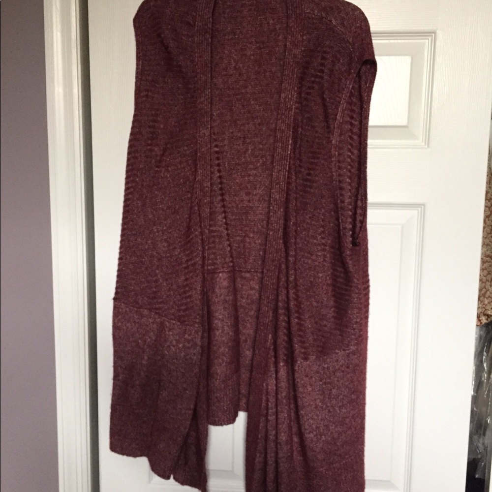Burgundy wool sleeveless vest , Kneelength