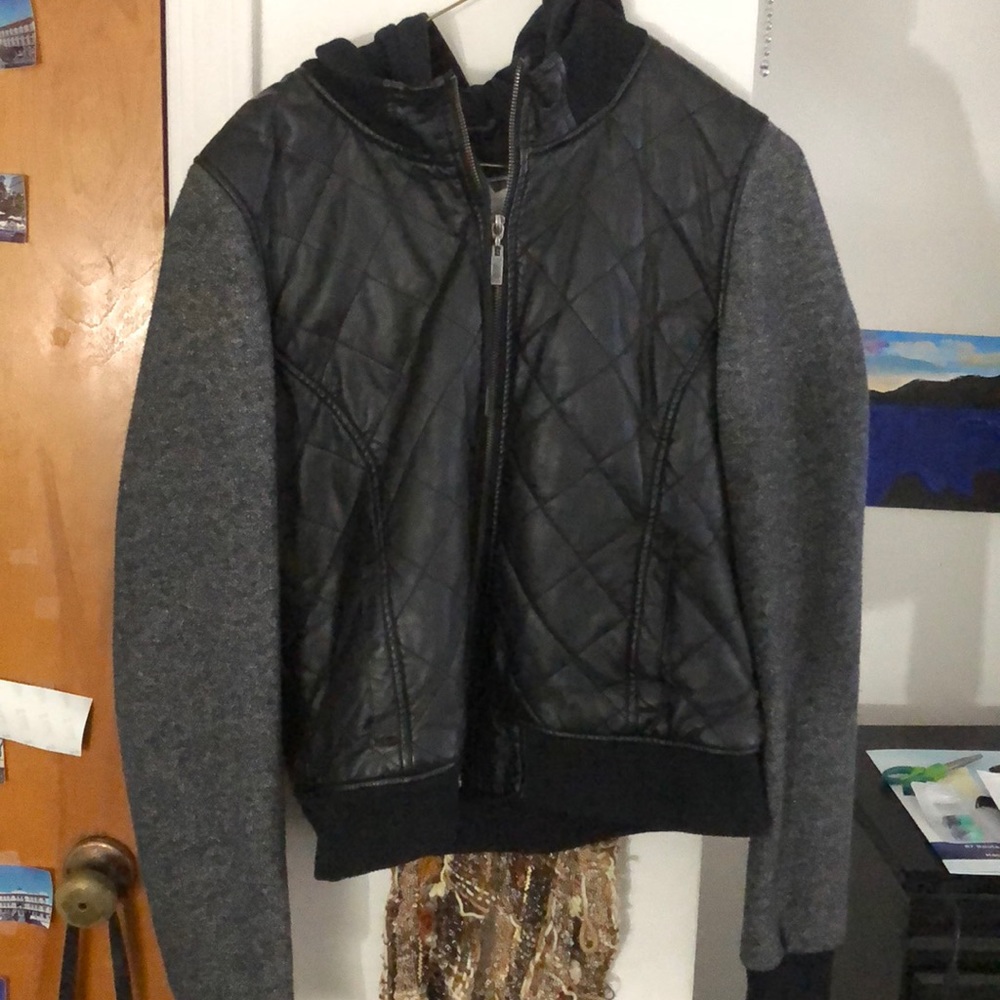 Leather jacket with soft sleeves