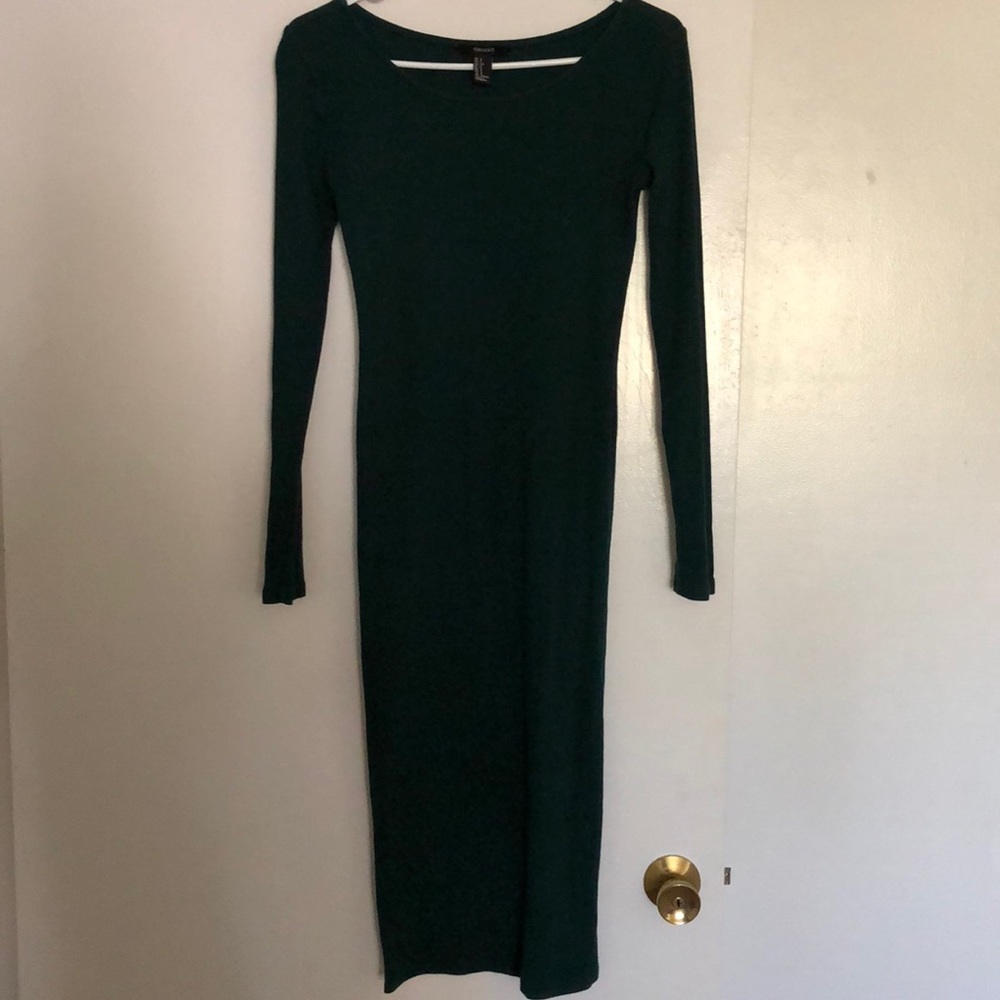 Green stretchy form hugging midi dress