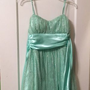 Green sparkly prom dress.