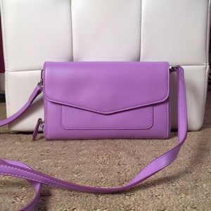 A small crossbody handbag (purse)