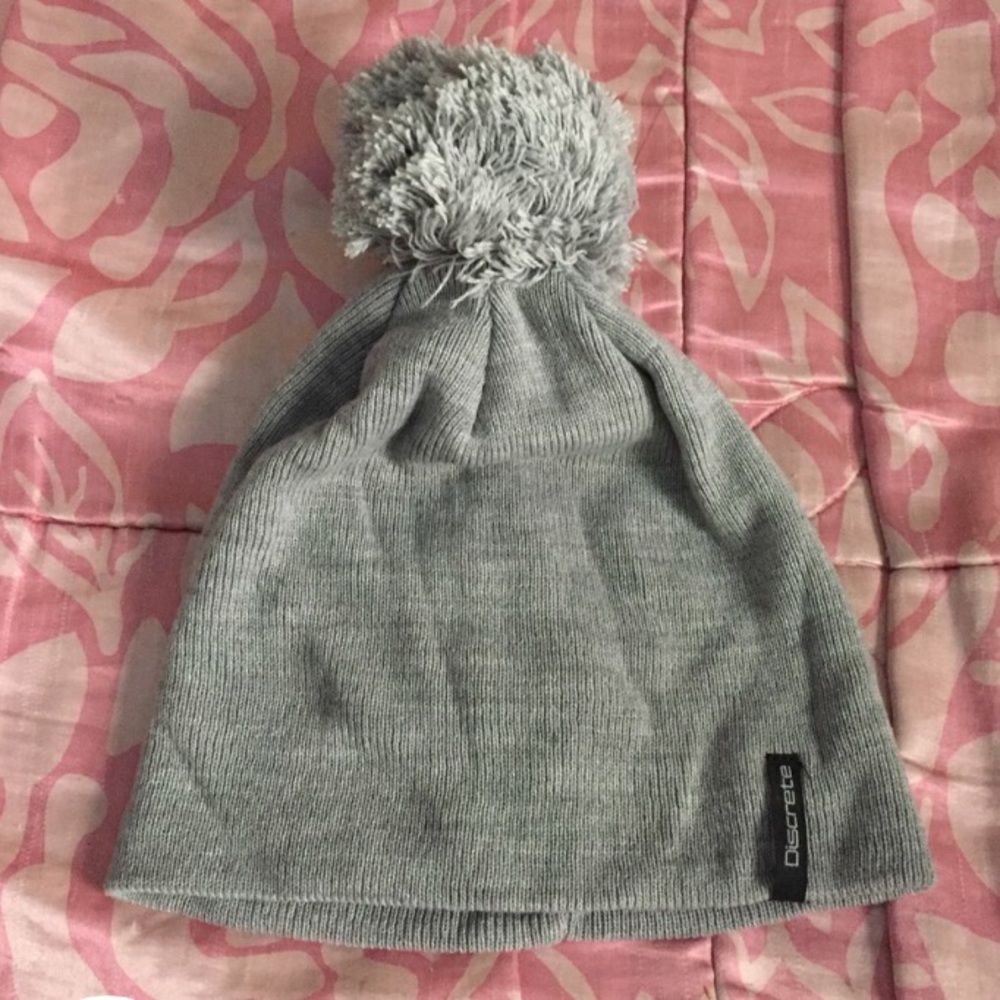 discrete pom pom beanie
