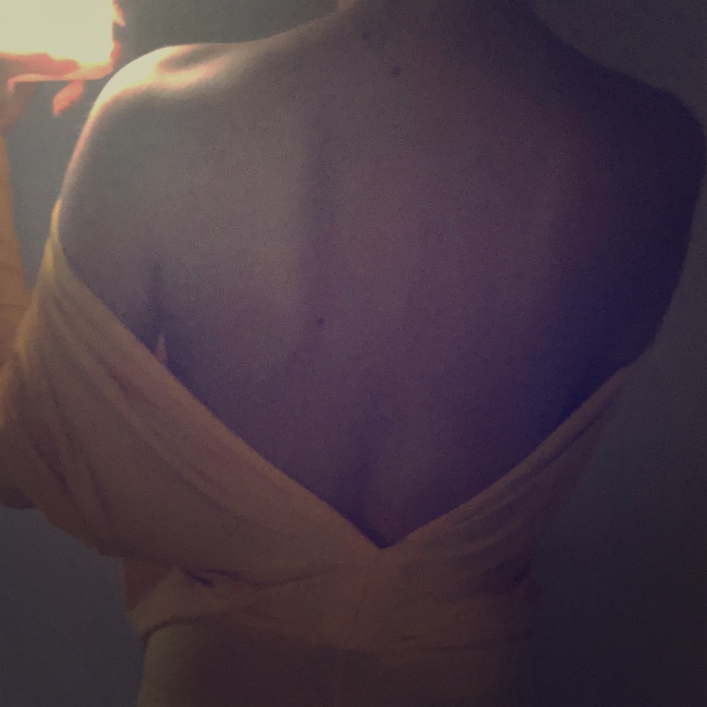 Long yellow open back dress