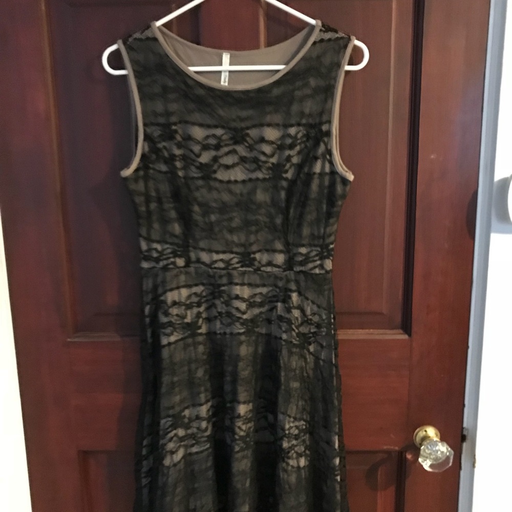 Lace dress made by Trinity size Med.