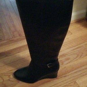 Tall boots.   Never worn