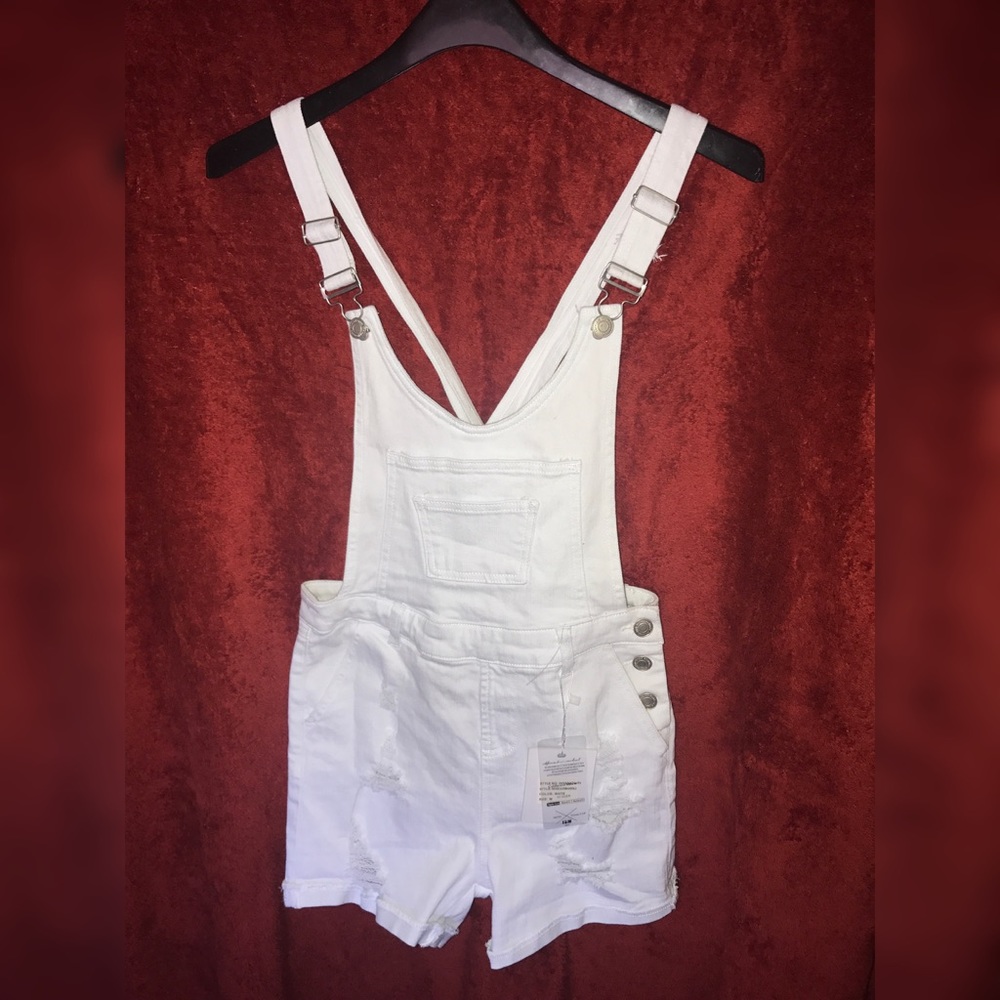White distressed overalls