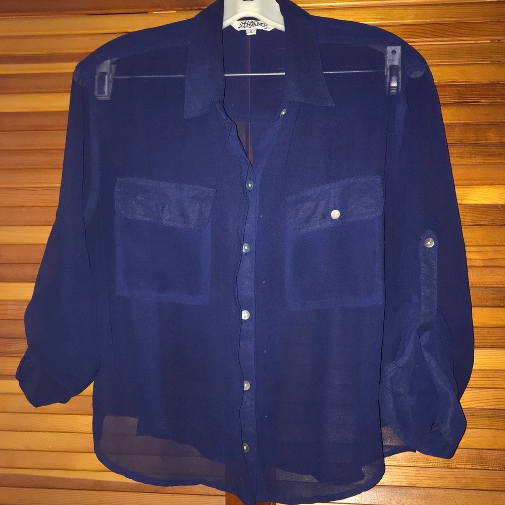 Women’s Shear blue button up shirt.