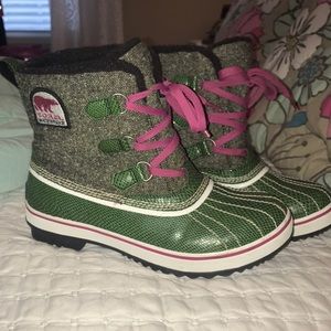 Waterproof Sorel women’s snake skin boots