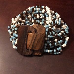 Beaded bracelet with wooden clasp