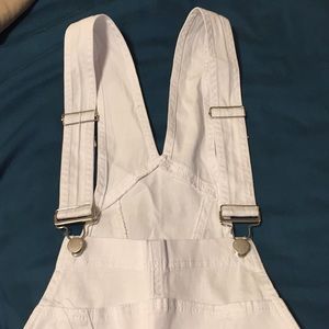 White skinny jean overalls