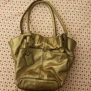 Women's goldish/bronzey colored purse...
