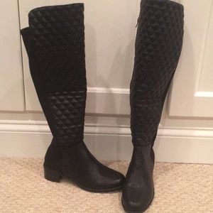 Tall black boots